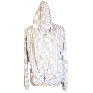 CHILL COLLECTIVE | Women's blue and white striped twist-hem hoodie sweater.